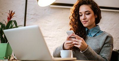 Young women using phone