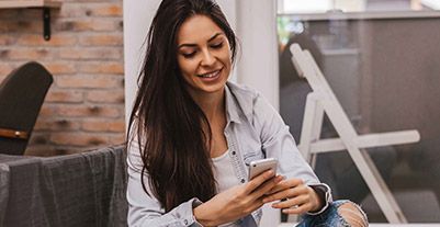 Young woman using a phone